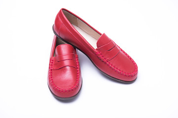 Kids moccasins on a white background