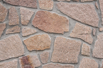 A wall lined with stone as a background