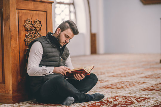 Humble Muslim reading Koran
