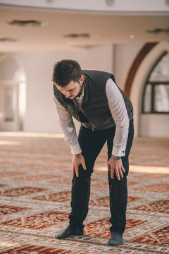 Muslim bowing humbly