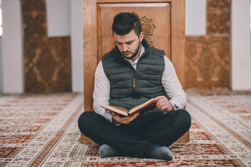 Humble Muslim reading Koran