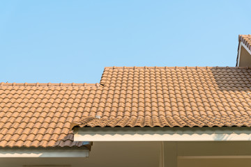 Modern tile roof with blue sky