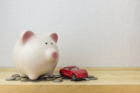 Piggy Bank With Car And Coins