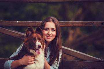 Young woman and border collie dog. concept about animals and people