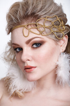 Portrait with professional make-up. Beauty Woman Portrait. Professional Makeup. Beautiful Fashion Model Girl. Perfect Skin. Make up. White Background. Part of face. Blonde