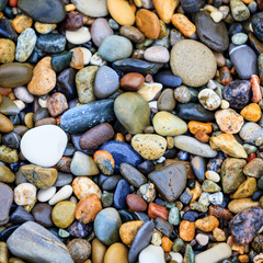 Sea stones background. stones on beach. stone texture.