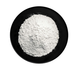 Plate with flour on white background