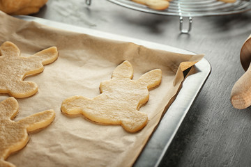 Raw Easter cookies on baking tray, closeup