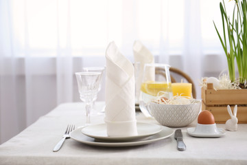 Beautiful Easter table setting in light room