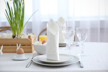 Beautiful Easter table setting in light room