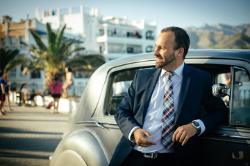 rich man in the summer in suit