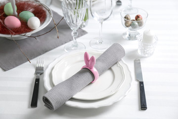 Beautiful Easter table setting in light room