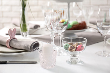 Beautiful Easter table setting in light room