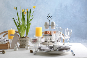 Beautiful Easter table setting in light room