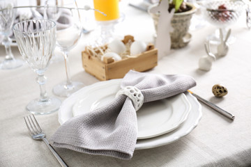 Beautiful Easter table setting in light room