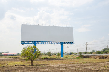 Blank big sign near highway with dry country
