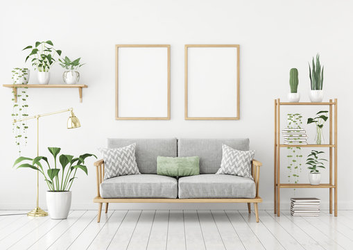 Scandinavian style poster mock up with two vertical frames, sofa and green plants on white wall background. 3d rendering.