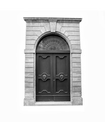 Wooden door in an old Italian house, isolated on white background, clipping path. Black and white.