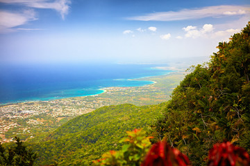 fascinating view on Puerto Plata city from the top of Pico Isabel de Torres - obrazy, fototapety, plakaty