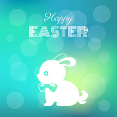 happy easter headline with silhouette bunny on bokeh background