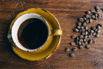 Coffee on a wooden table. top view, flat lay