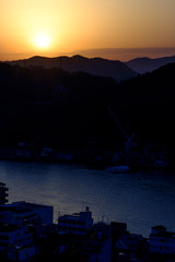 Silhouette of mountains and town at the dawn