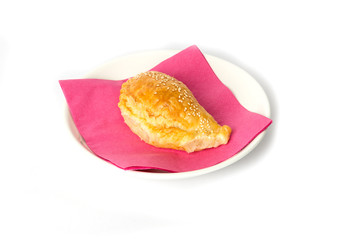 Heap of small chebureks isolated on white background