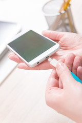 Connecting blue USB charging cable