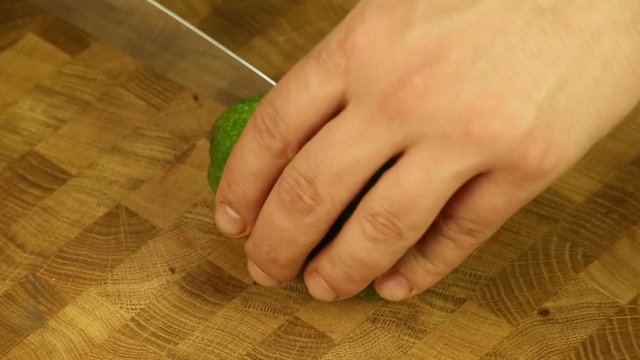 Cut the avocado with a sharp knife