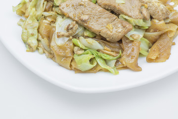 Noodles fried with pork and vegetable.