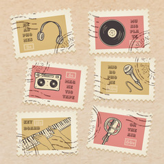 Vector postage stamps collection, retro music equipment theme, canceled - decorative set for scrapbooking on realistic cardboard background