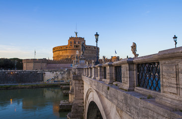 Castle of Holy Angel (Castel Sant Angelo)  and Holy Angel Bridge over the Tiber River in Rome at...
