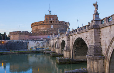 Castle of Holy Angel (Castel Sant Angelo)  and Holy Angel Bridge over the Tiber River in Rome at...