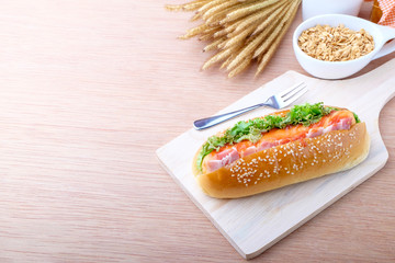 Hot dog on wood background