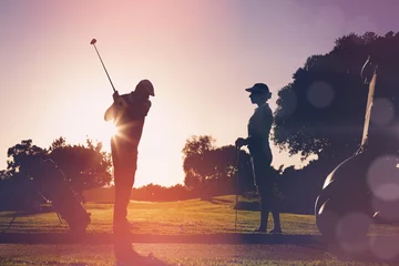 Papier Peint photo Golf Image composite du couple de golf jouant ensemble