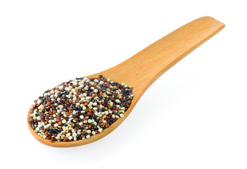 Quinoa seeds in wood scoop on white background