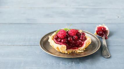  Fresh crisp tartlets filled with jam of raspberries, blueberries, berry pie