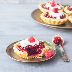  Fresh crisp tartlets filled with jam of raspberries, blueberries, berry pie