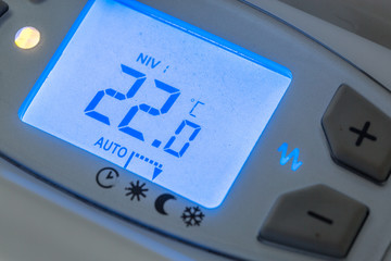 closeup of modern radiator with digital temperature