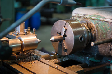 Machine-building production. Machining detail on metal lathe