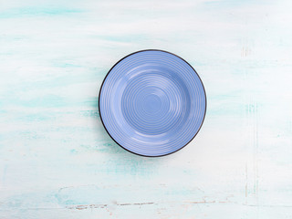 Pastel Color blue purple ceramic plate dish top view background