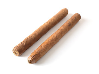 Two cigars on white background