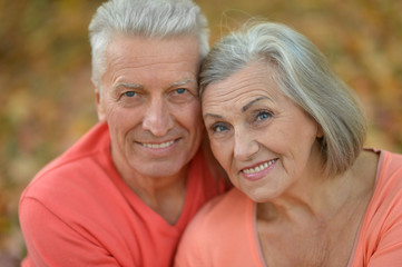 Happy elderly couple embracing