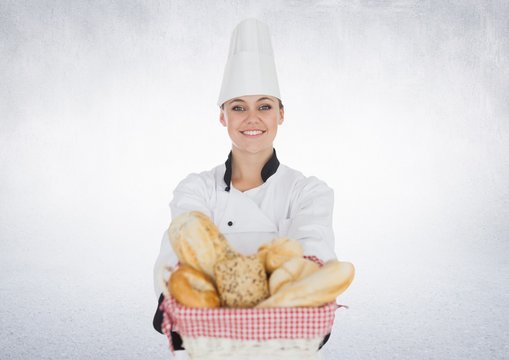 Composite image of Chef with bread against white background