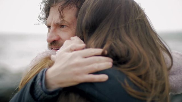 Man in love not able to breath hugging wife