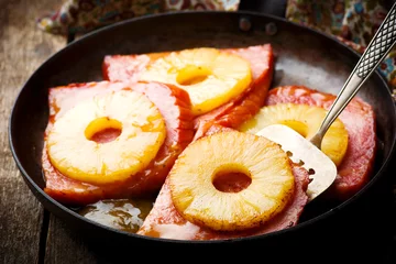 Raamstickers Ham with Pineapple in iron pan © zoryanchik