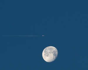 Morning moon and plane seen from California.