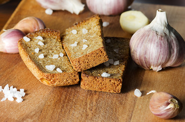 Toast of black bread with garlic and sea salt