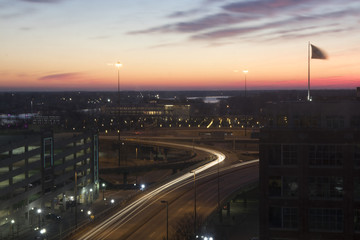 Fototapeta na wymiar orange sunrise or sunset and long exposure city traffic 