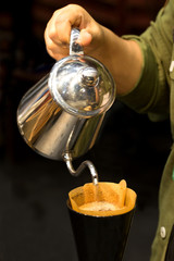 Professional barista preparing coffee alternative method